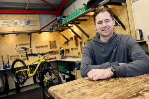Mountain biker opens bicycle repair on the Drum Industrial Estate